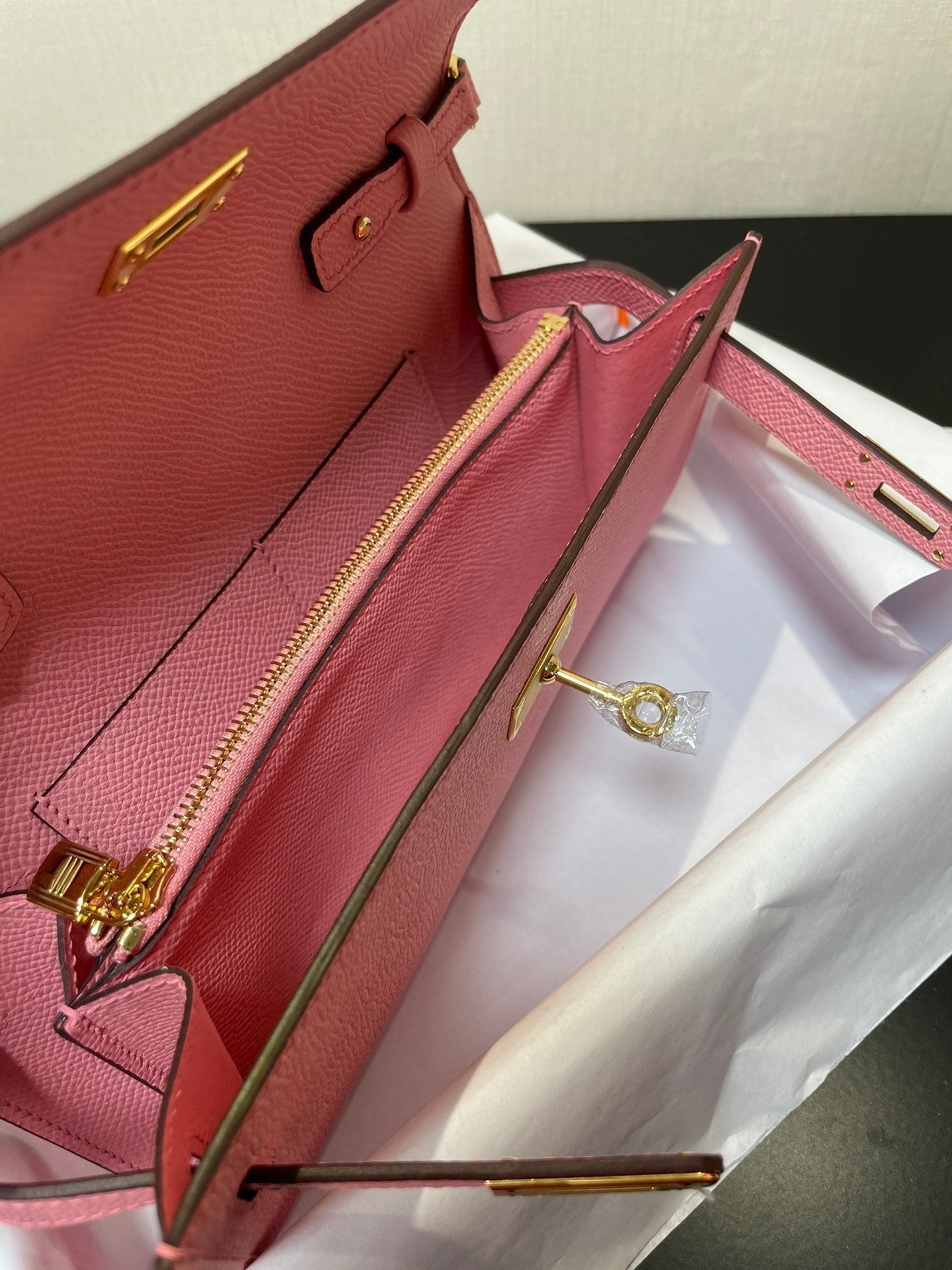 kelly woc 20.5 pink epsom gold hardware