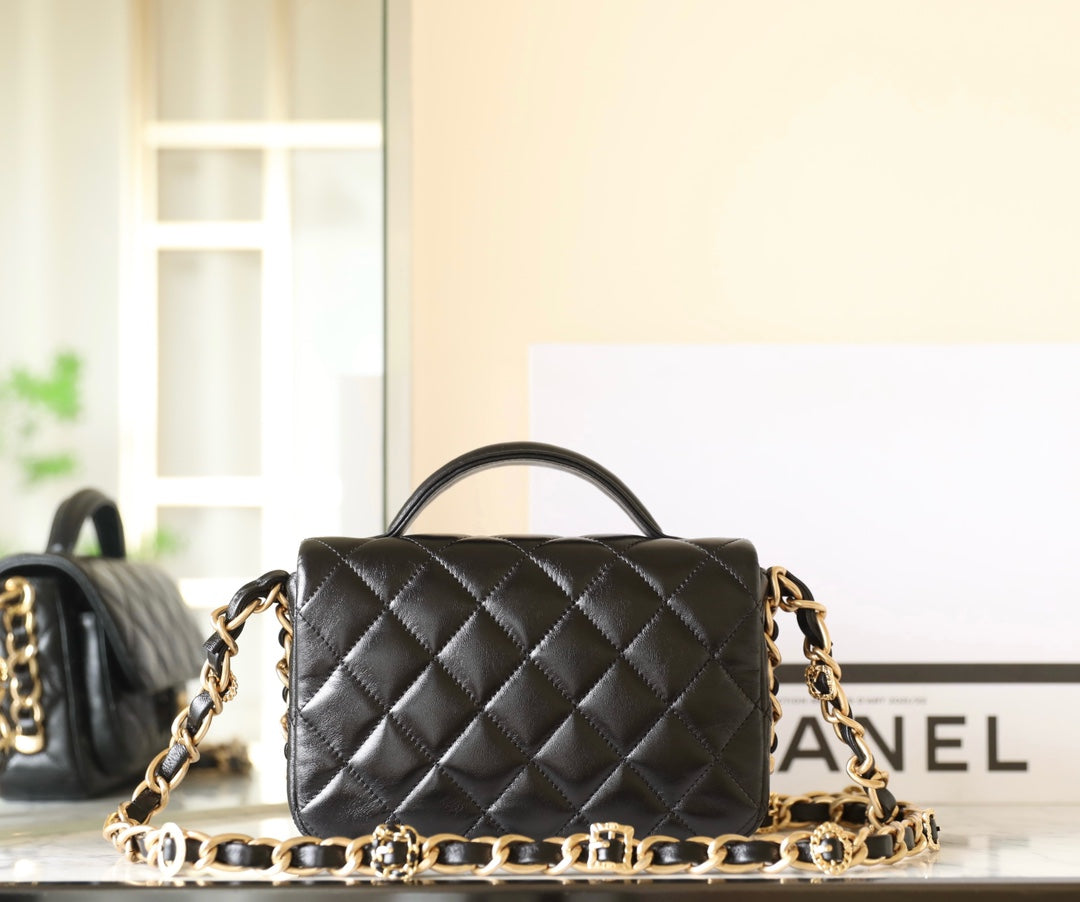 cc 24a flap bag 20cm top handle black  lambskin gold hardware