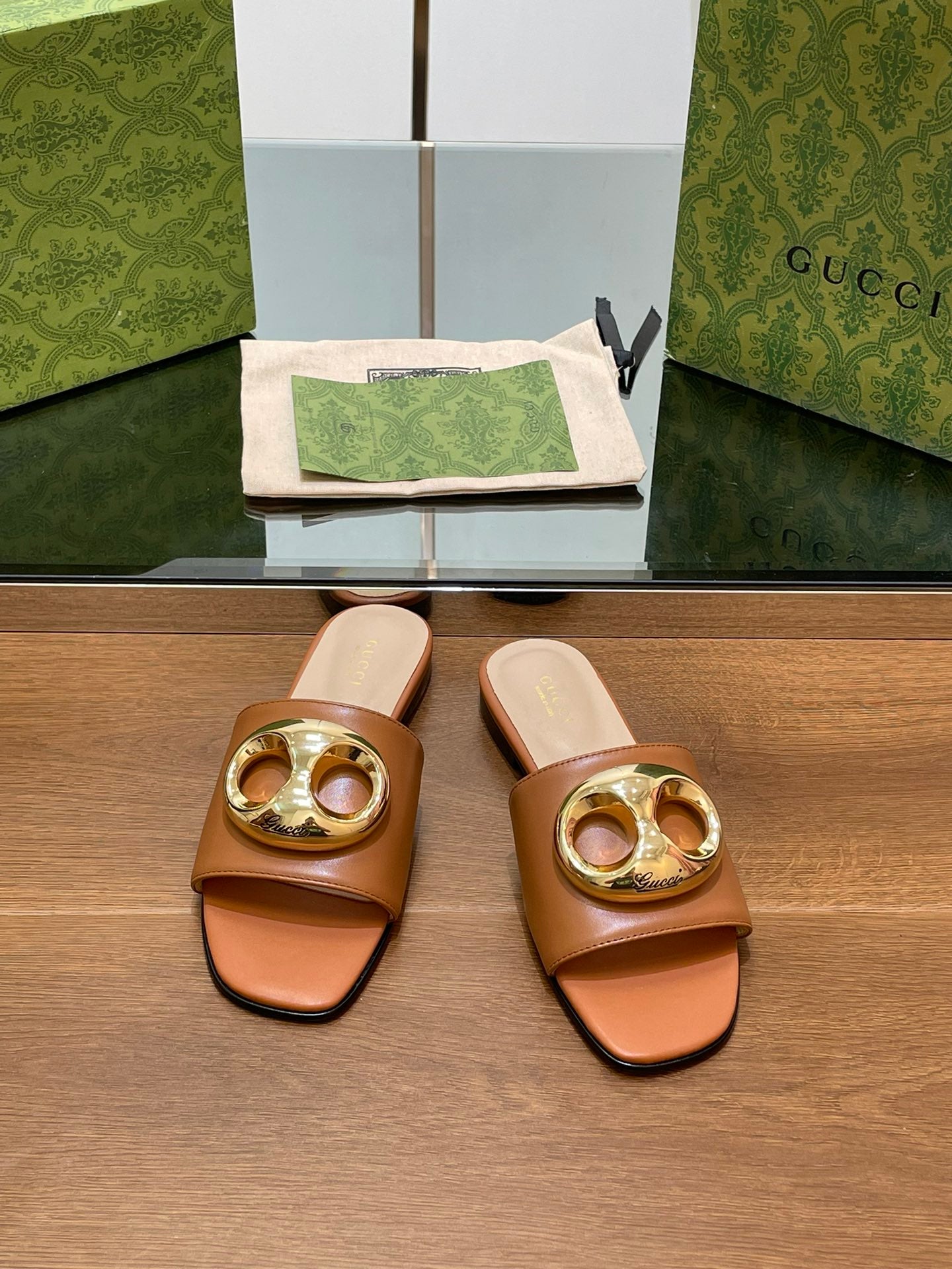 FLAT MULE IN BRONE BROWN CALFSKIN