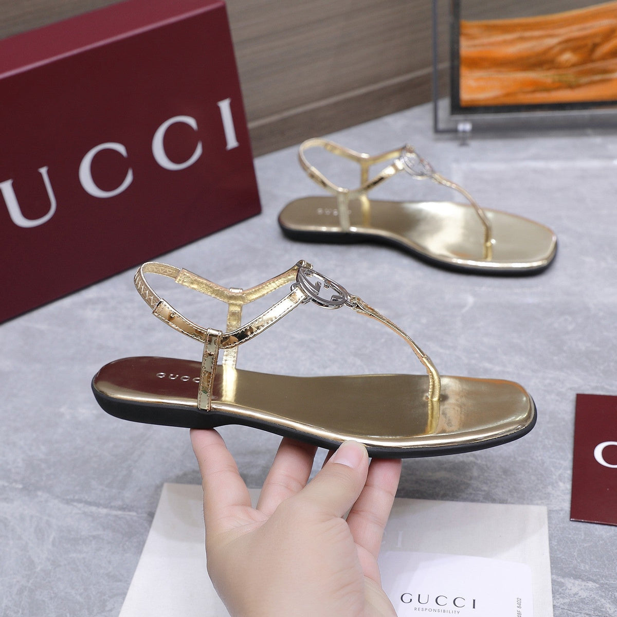 GG Thong Sandal With Interlocking G Gold Sheepskin 864295