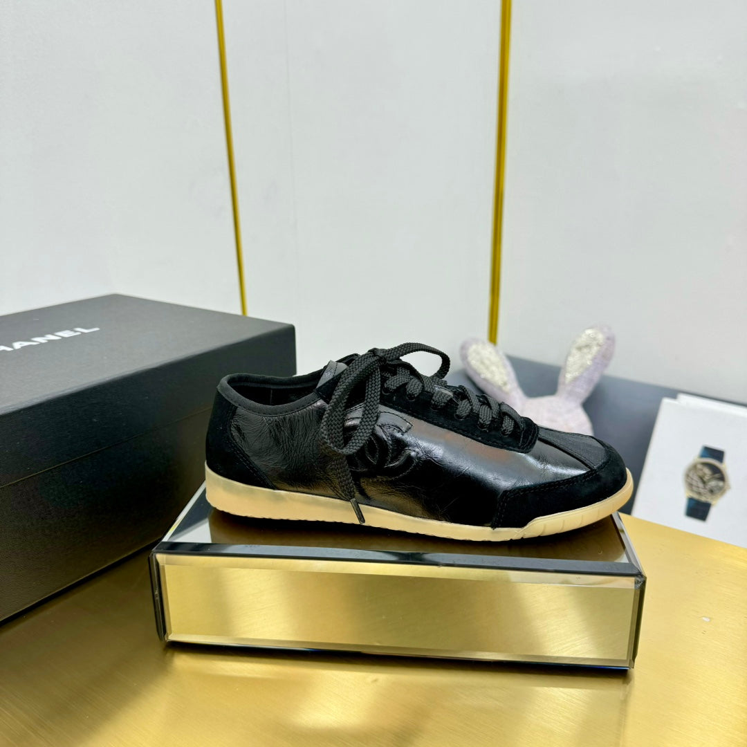 CC SNEAKER IN BLACK CALFSKIN AND SUEDE