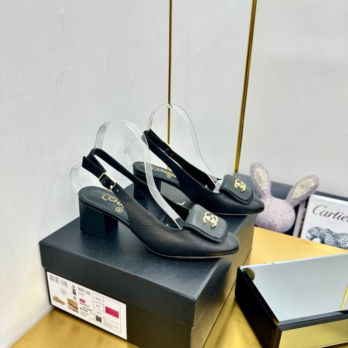 CC Slingback 25s In Black Calfskin With Gold Hardware