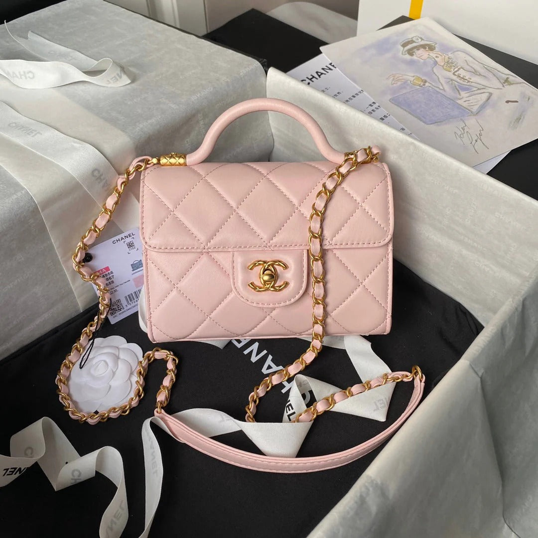CC  25S FLAP BAG 18 CM IN LIGHT PINK LAMBSKIN WITH TOP HANDLE