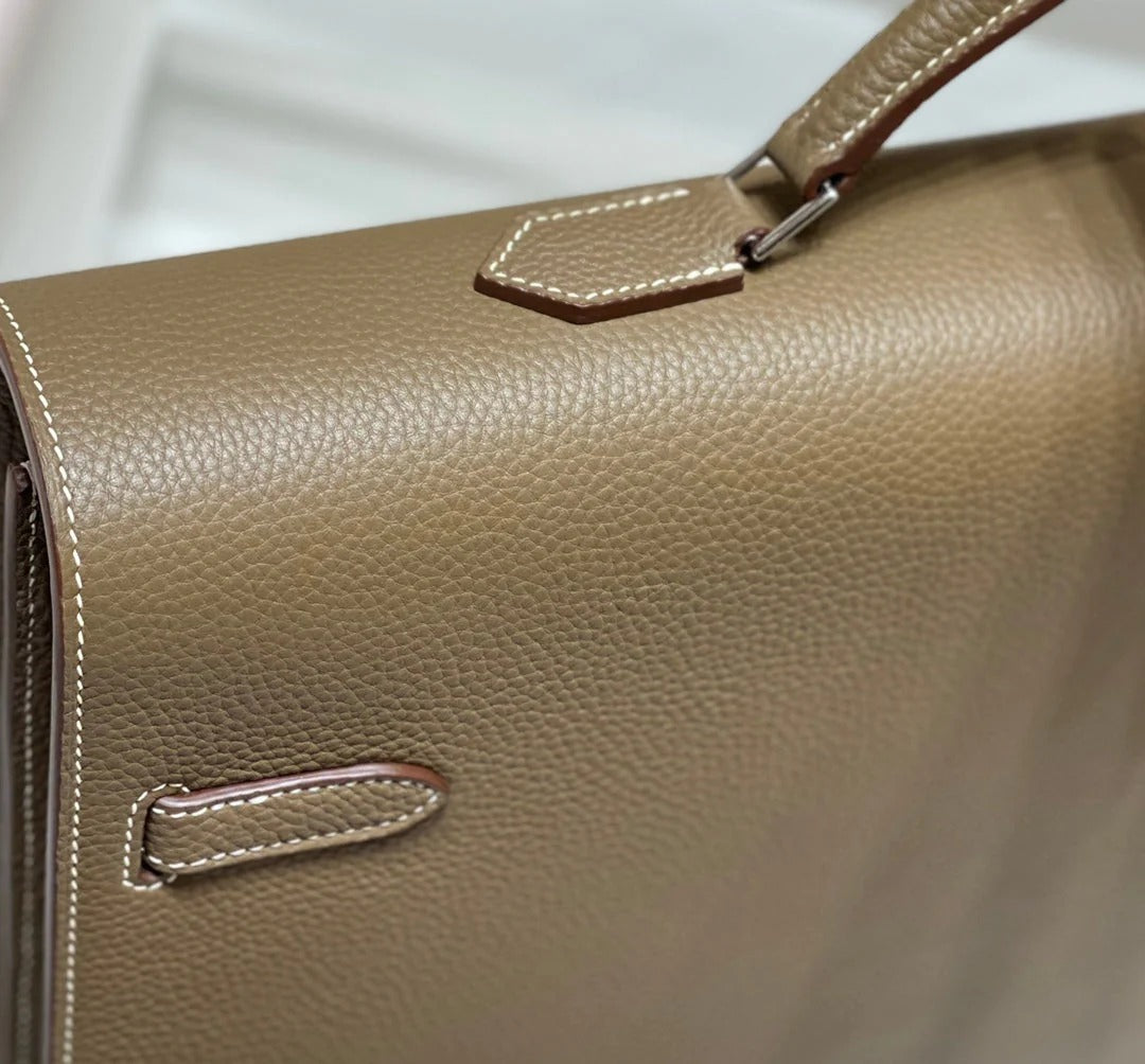 KELLY DEPECHES 38 BRIEFCASE IN ETOUPE TOGO CALFSKIN SILVER HARDWARE